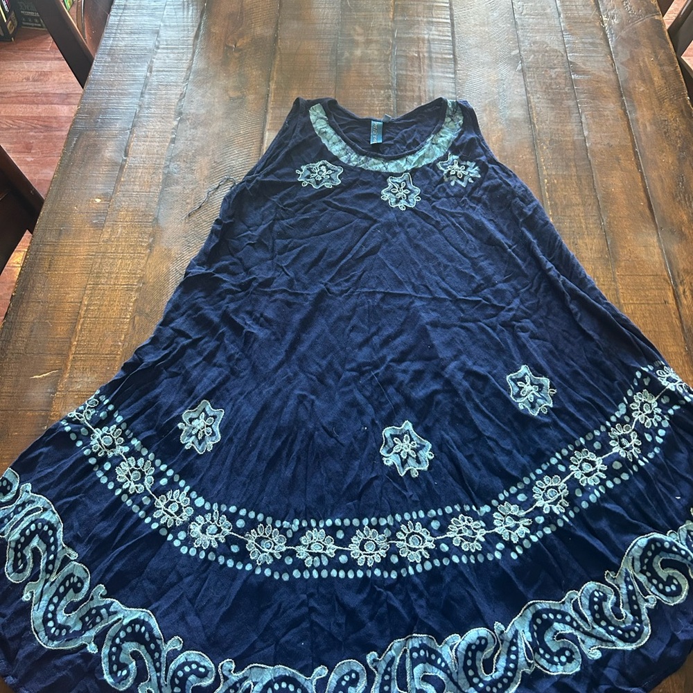 Navy Blue Sleeveless Dress with Floral Patterns
